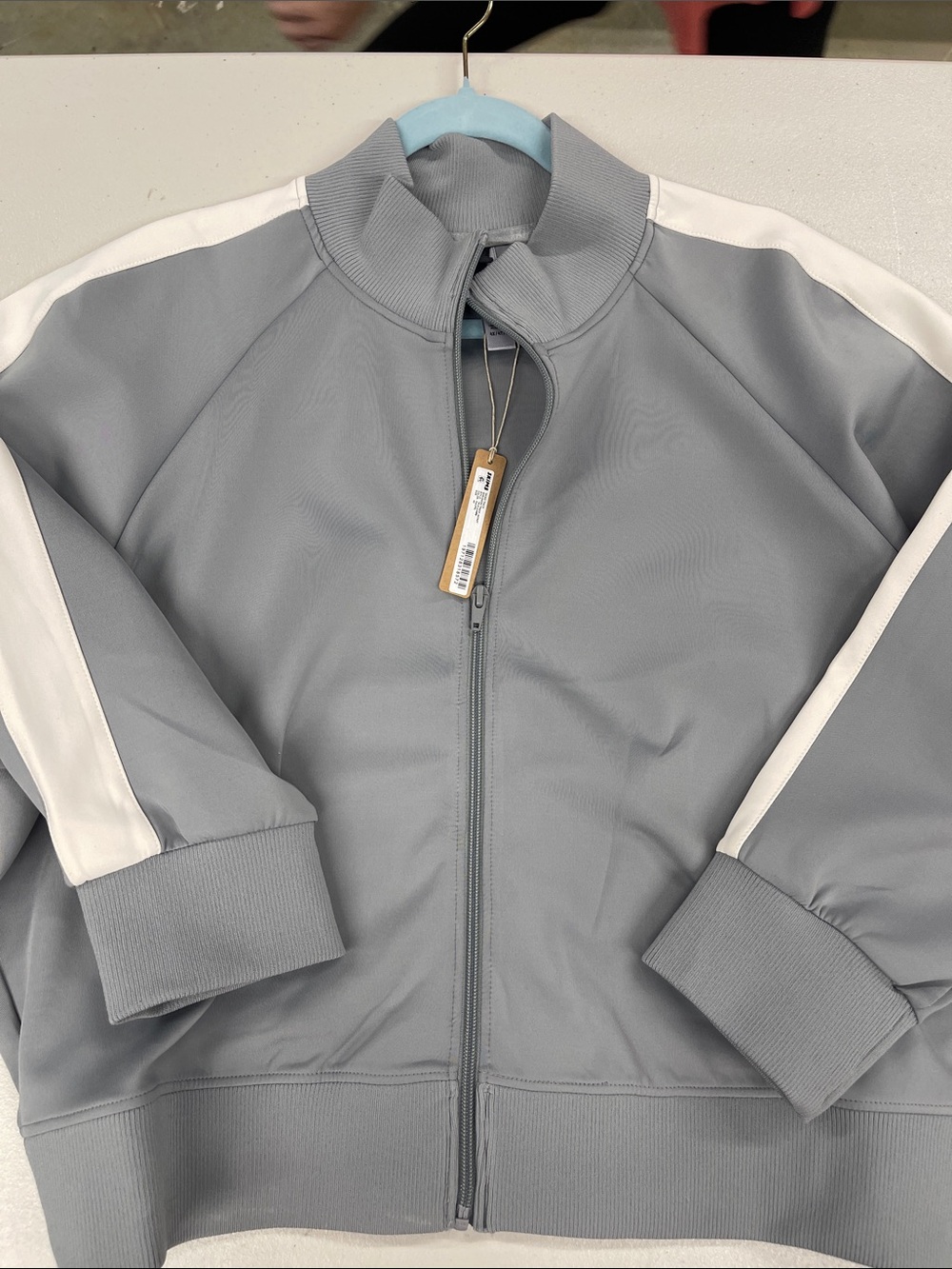 SKIMS Light Gray Zip-Front Jacket with White Tag Detail
